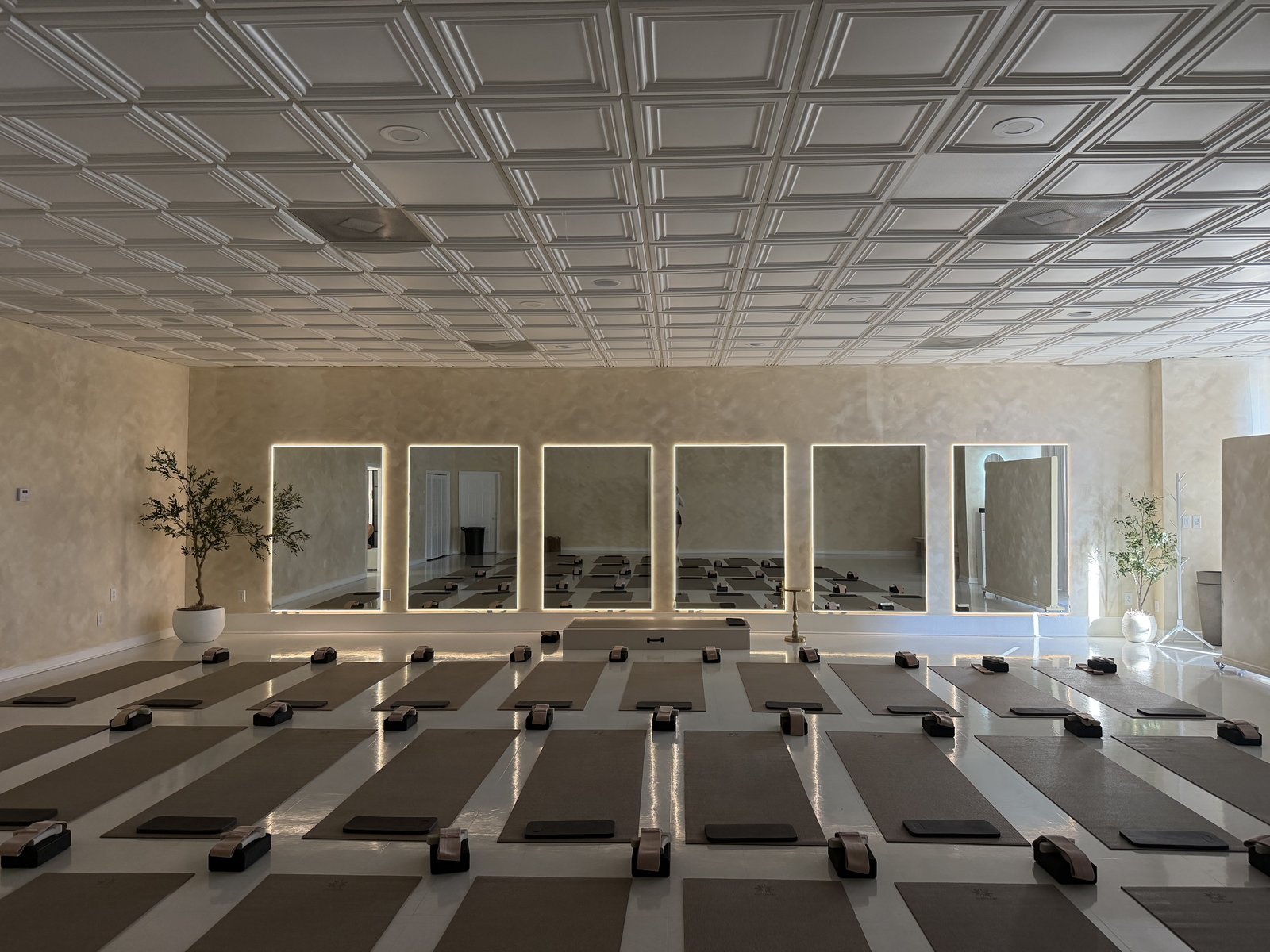 Yoga studio mirror installation